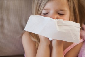 Cute little girl suffering from cold